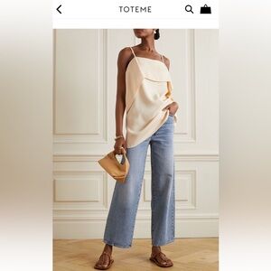 Toteme flare fit denim in worn blue size 27